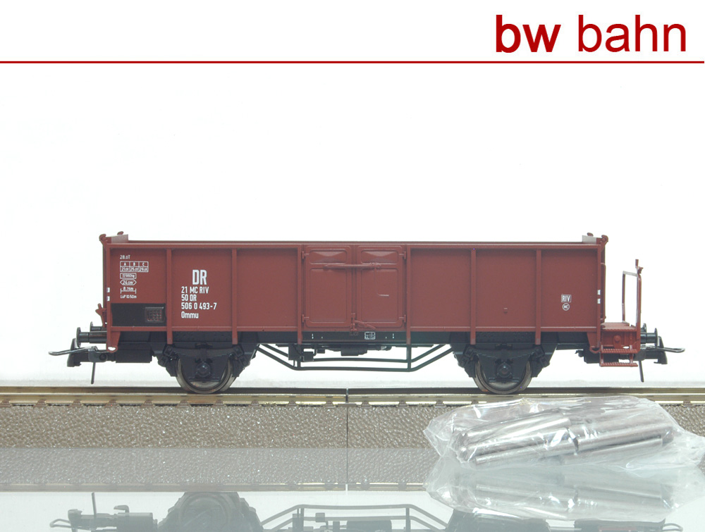 Roco H0 47925 Offener Güterwagen Ommu der DR mit Bremserbühne und Ladung Neu - Zdjęcie 1 z 1